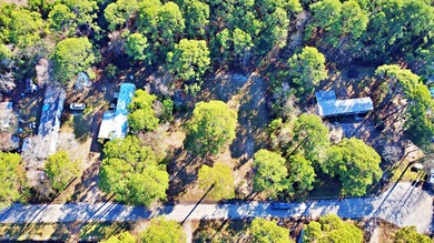 Cleared and build-ready vacant lot totaling approximately 0.4 - photo 1