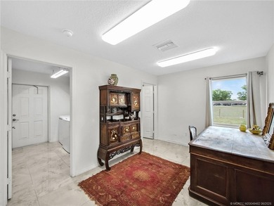 Welcome to this stunning waterfront home located on a rim canal - photo 15