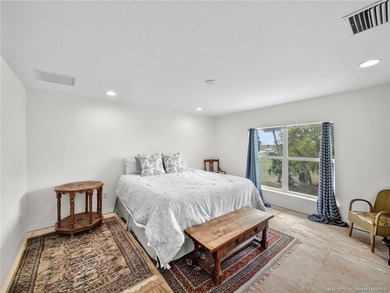 Welcome to this stunning waterfront home located on a rim canal - photo 18