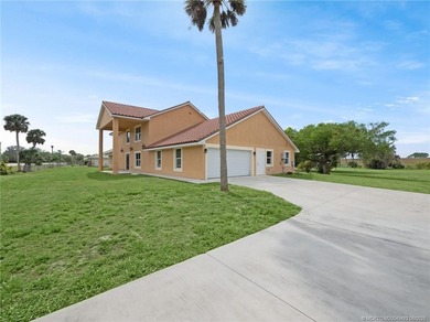 Welcome to this stunning waterfront home located on a rim canal - photo 27