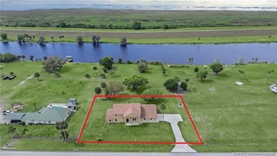Welcome to this stunning waterfront home located on a rim canal - photo 31