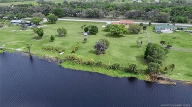 Welcome to this stunning waterfront home located on a rim canal - photo 32