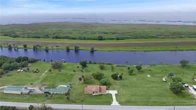 Welcome to this stunning waterfront home located on a rim canal - photo 35