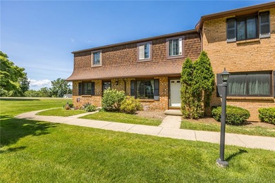 Move-in ready, low-maintenance living awaits! Welcome to 8 - photo 1