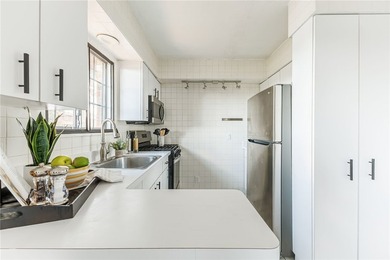 Move-in ready, low-maintenance living awaits! Welcome to 8 - photo 10