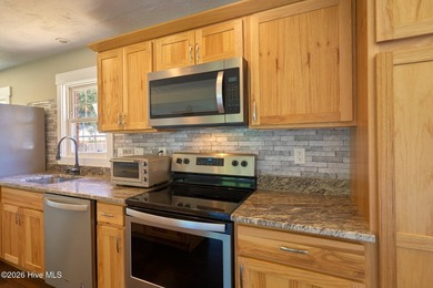 Welcome to 685 Edens Lane, where coastal convenience meets - photo 11