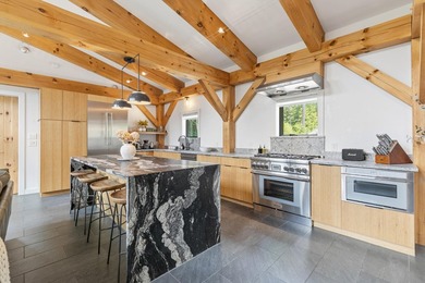 Discover a rare 10+ acre waterfront property encompassing two - photo 16