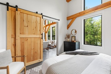 Discover a rare 10+ acre waterfront property encompassing two - photo 27