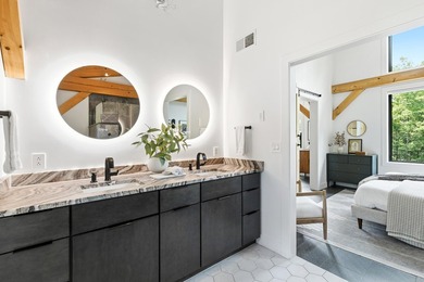 Discover a rare 10+ acre waterfront property encompassing two - photo 30