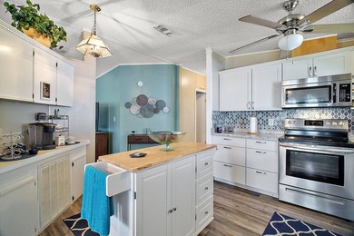 Nestled within the desirable Lake Griffin Habor, a vibrant - photo 3