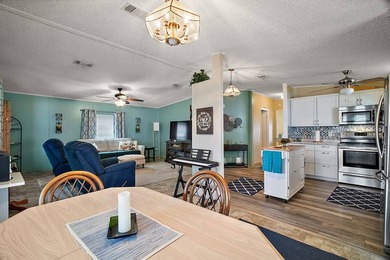 Nestled within the desirable Lake Griffin Habor, a vibrant - photo 6
