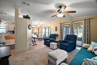 Nestled within the desirable Lake Griffin Habor, a vibrant - photo 8
