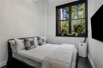 Set in the heart of Buckhead, this sleek, renovated two-bedroom