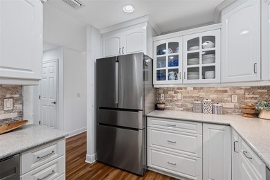Experience luxury waterfront living in this beautifully updated - photo 17