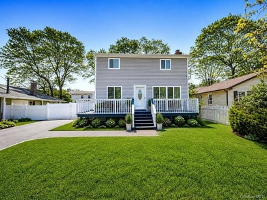 Welcome Home to this Beautiful Colonial in the heart of Mastic - photo 1