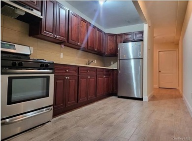 Welcome to 27 Cox Place , a well-maintained, attached brick - photo 2