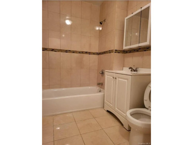 Welcome to 27 Cox Place , a well-maintained, attached brick - photo 4