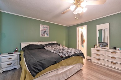 Welcome home to this beautifully updated 4-bedroom, 3-bath - photo 11