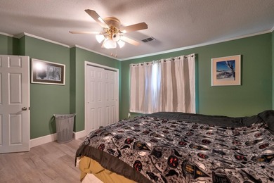Welcome home to this beautifully updated 4-bedroom, 3-bath - photo 13