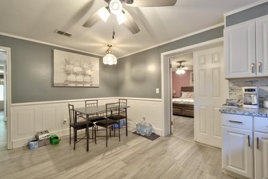Welcome home to this beautifully updated 4-bedroom, 3-bath - photo 31