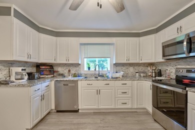 Welcome home to this beautifully updated 4-bedroom, 3-bath - photo 34