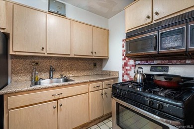 Welcome to this charming 2-bedroom, 1-bath duplex co-op located - photo 9