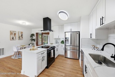Completely renovated and move-in ready! This beautiful 4-bedroom - photo 11