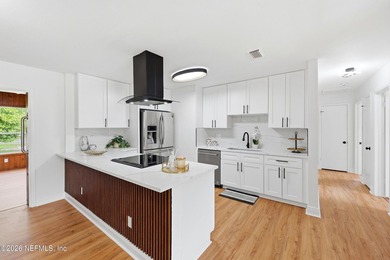 Completely renovated and move-in ready! This beautiful 4-bedroom - photo 12