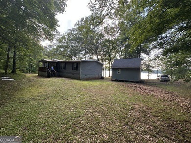 Experience lake living at its finest with this beautifully - photo 1
