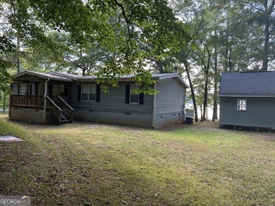 Experience lake living at its finest with this beautifully - photo 2