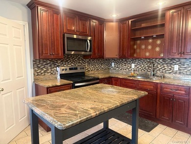 Welcome to this beautifully updated cape-style home situated on - photo 8