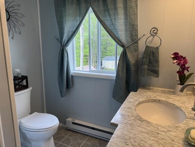 This Lake Winnipesaukee Access Home is waiting for you! The - photo 31