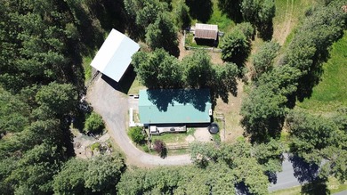 Private 1.4 +/- acre wooded parcel is located on the outskirts - photo 1
