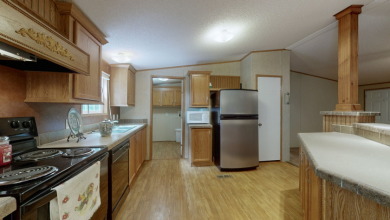 Home with 3.2 acres near lake with 3 campsites. - photo 12