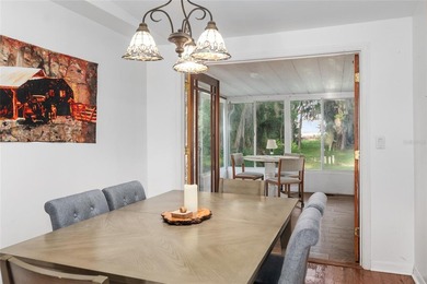 Tucked away among majestic live oaks and native palms, this - photo 22