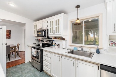 Tucked away among majestic live oaks and native palms, this - photo 26
