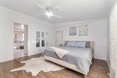 Tucked away among majestic live oaks and native palms, this - photo 32