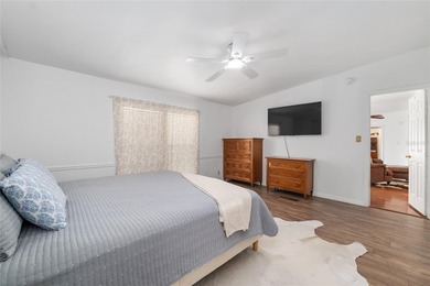 Tucked away among majestic live oaks and native palms, this - photo 33