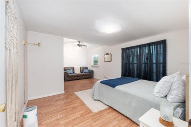 Tucked away among majestic live oaks and native palms, this - photo 40