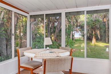 Tucked away among majestic live oaks and native palms, this - photo 45