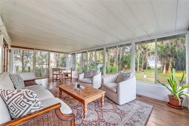Tucked away among majestic live oaks and native palms, this - photo 46