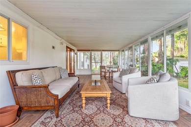 Tucked away among majestic live oaks and native palms, this - photo 47