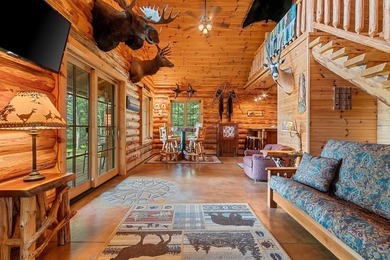 Experience true Northwoods living in this beautiful full log - photo 13