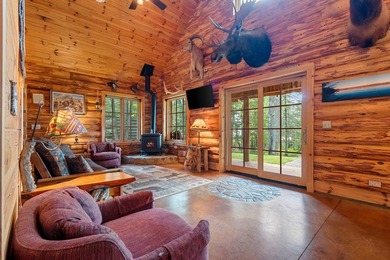 Experience true Northwoods living in this beautiful full log - photo 15