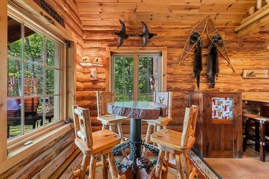 Experience true Northwoods living in this beautiful full log - photo 16