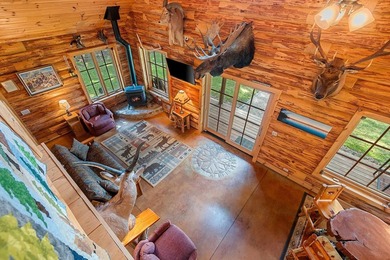 Experience true Northwoods living in this beautiful full log - photo 28