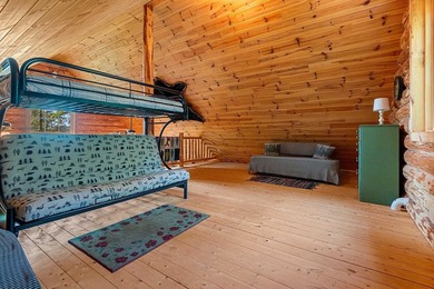 Experience true Northwoods living in this beautiful full log - photo 30