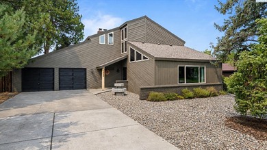 MLS# 294937 Modern lines. Mid-century vibes. A backyard you'll