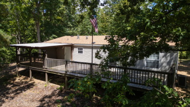 Home with 3.2 acres near lake with 3 campsites. - photo 4