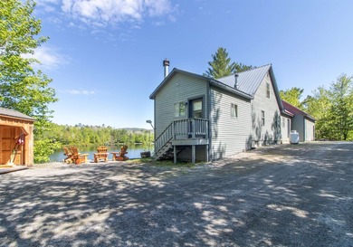 Discover year-round lakeside living with this inviting 3-bedroom - photo 6